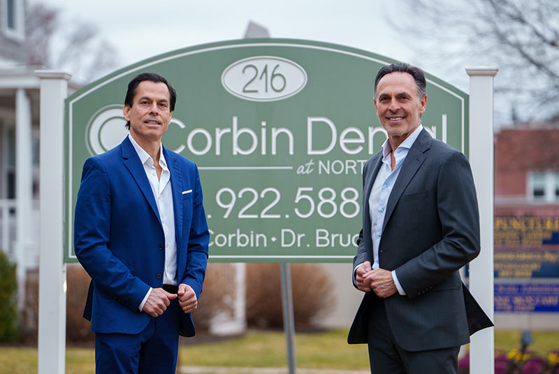 Doctor smiling standing next to each other