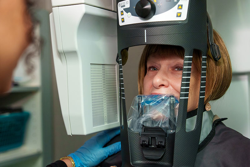 Patient taking a dental x-ray