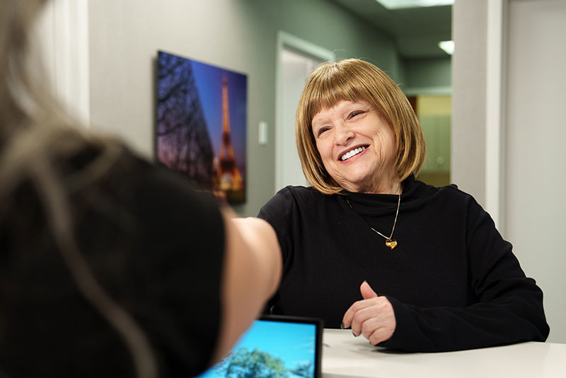 Patient shaking Team members hand
