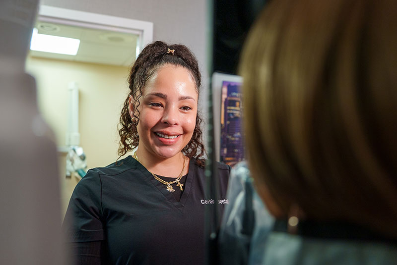 Team member helping Patient