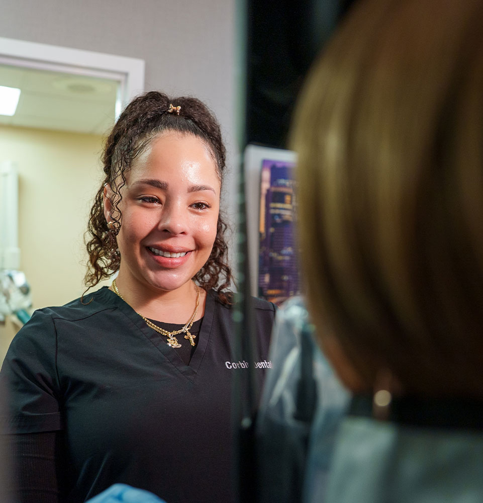 Team member Taking a Dental x-ray for Patient