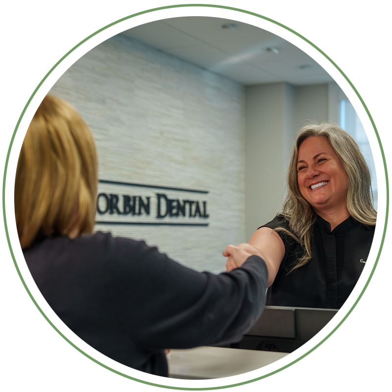 Patent shaking team members hand