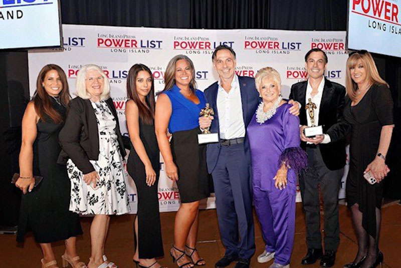 all the doctor team together happy with award