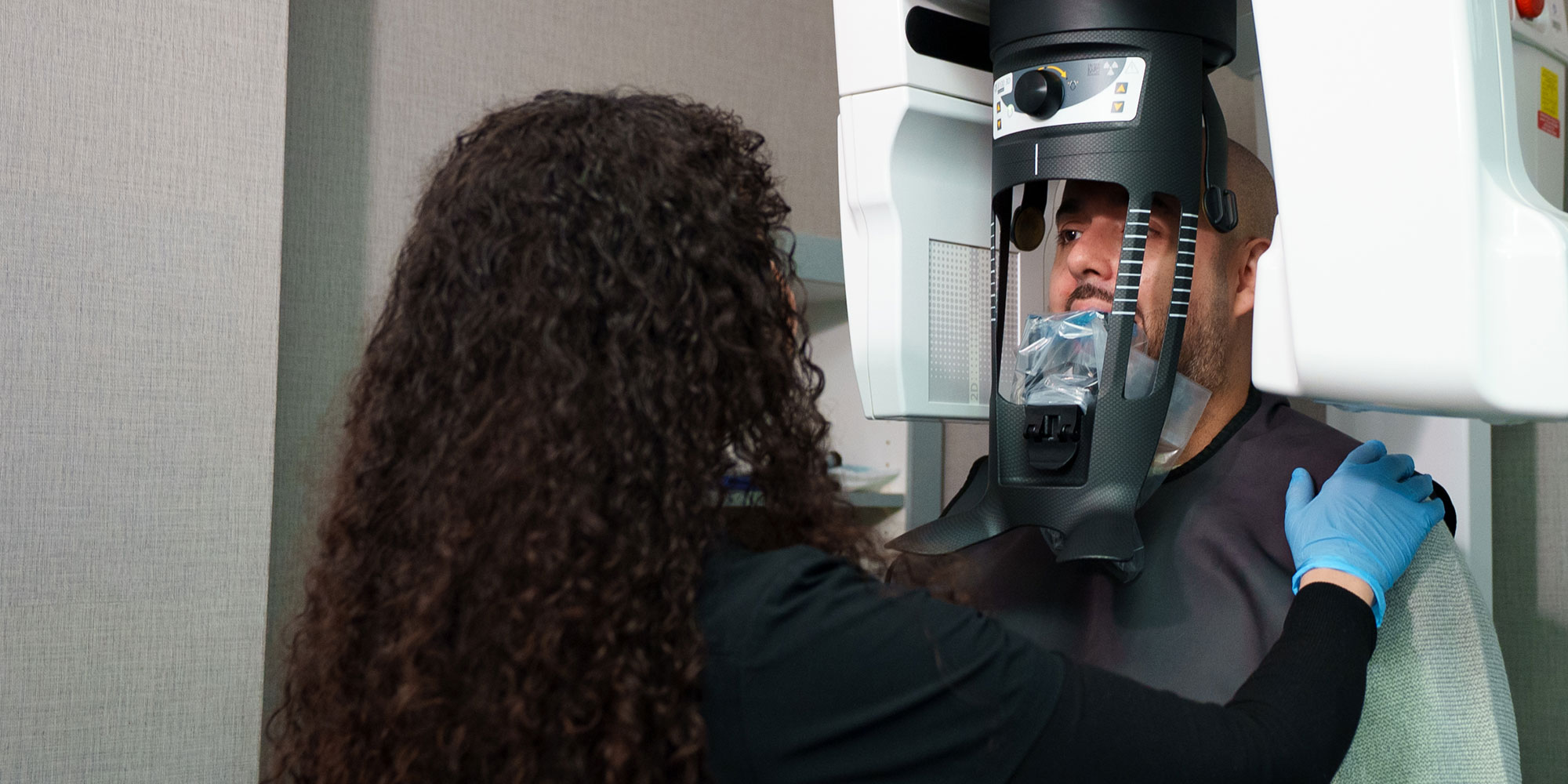Patient taking a dental x-ray