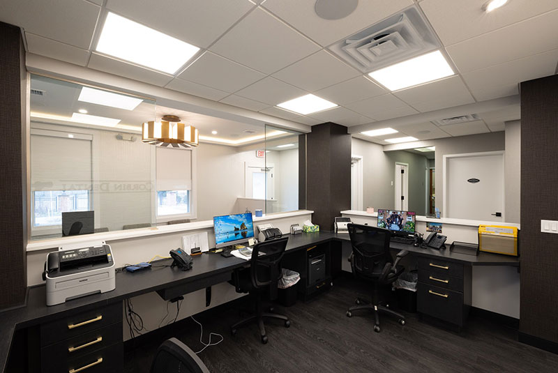 behind front desk Oyster Bay