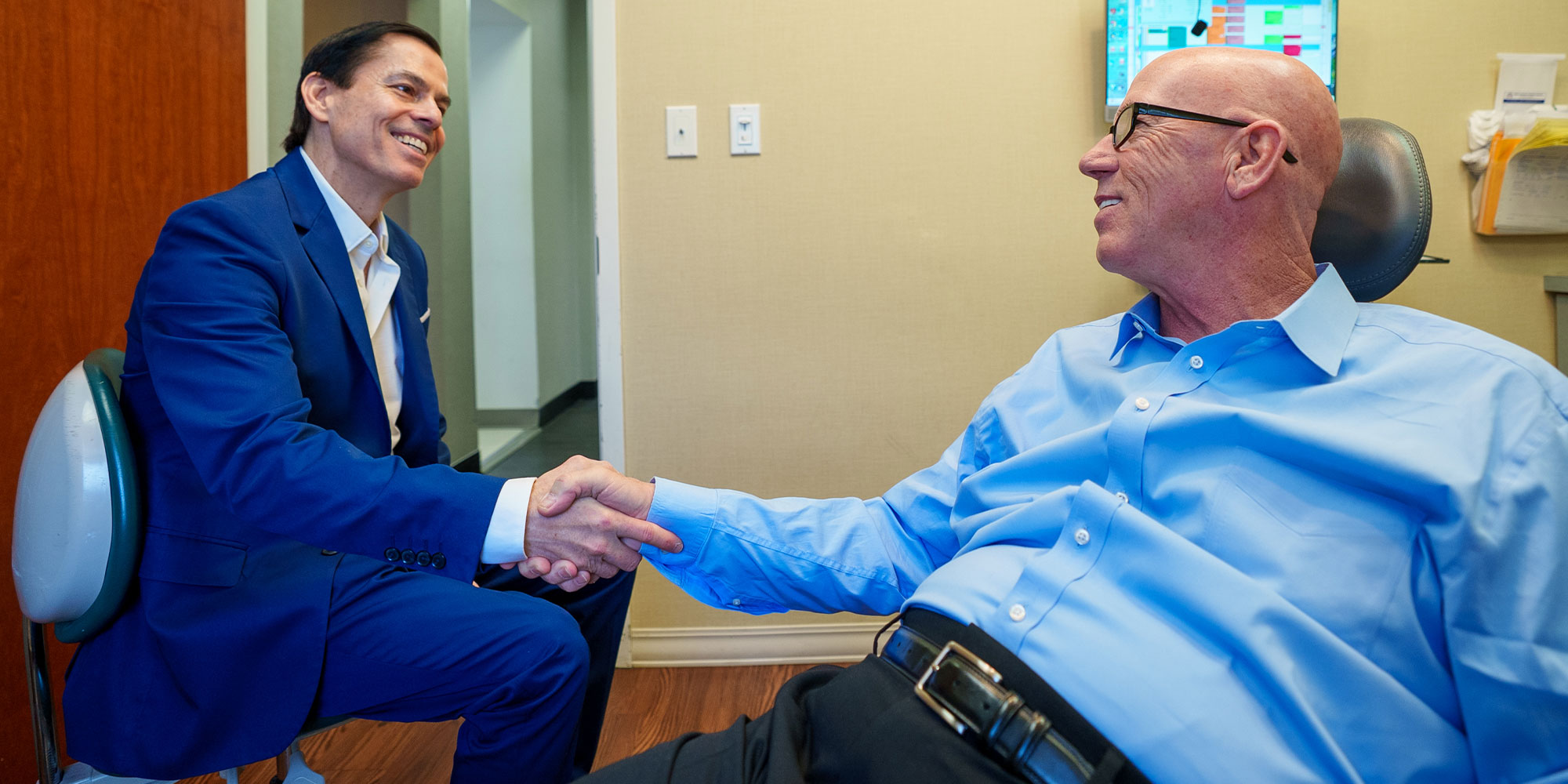 Patient shakign doctors hand