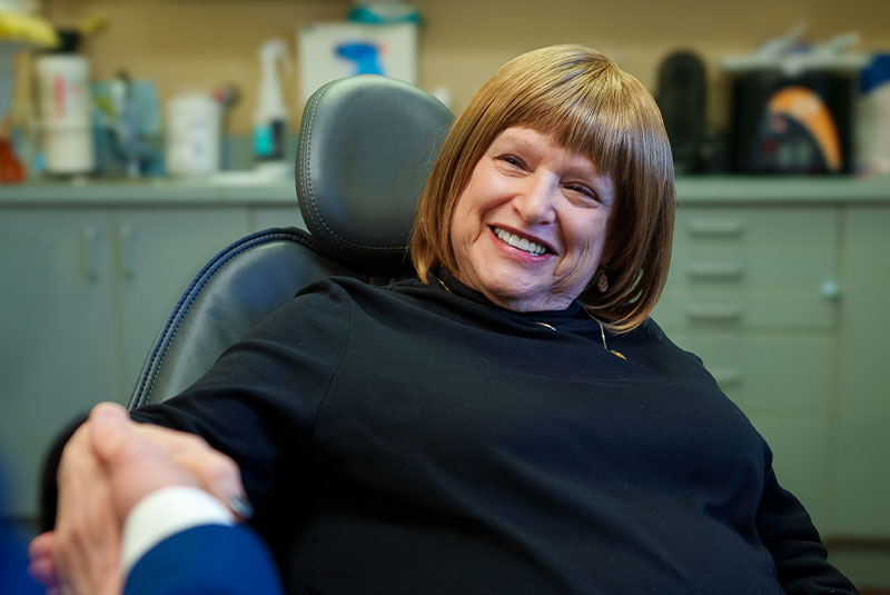 sedation patient shaking hands happy